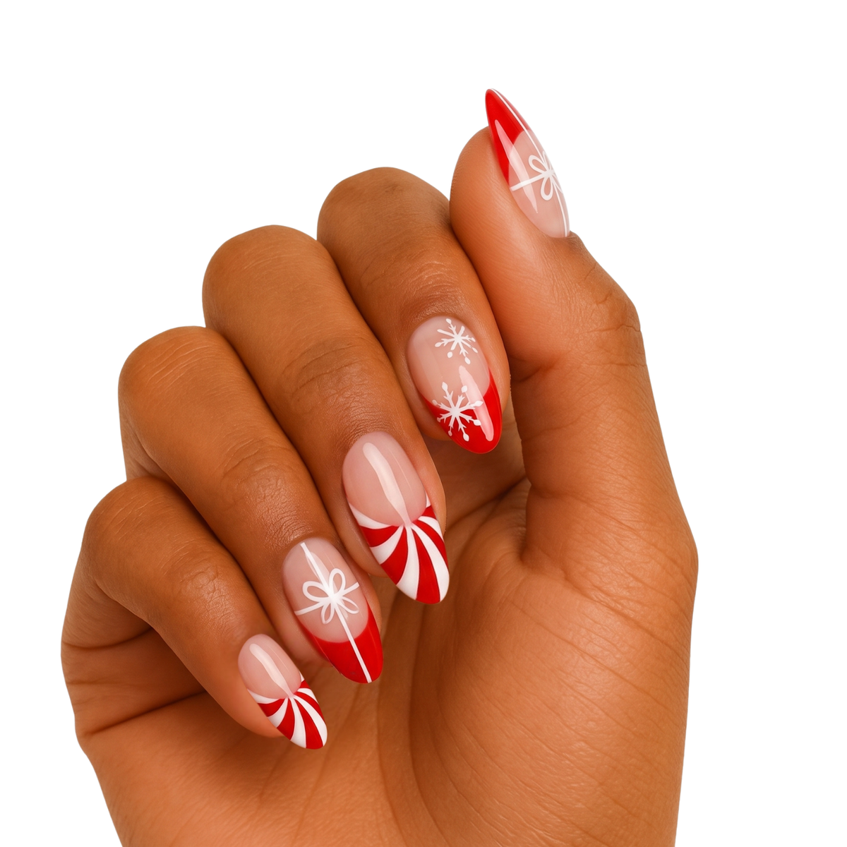Red and white semi-cured gel wraps with candy cane swirls, bows and snowflakes on sheer base