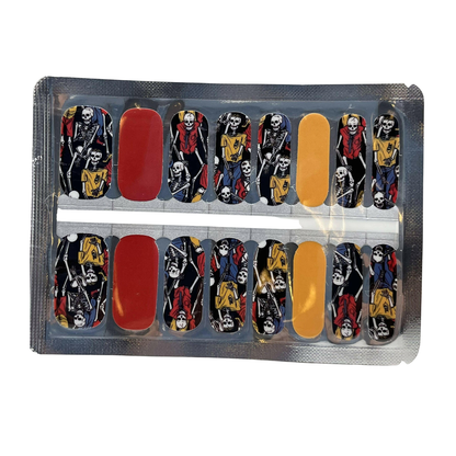 Holy Classics nail wraps with skeleton print, solid red and mustard accent nails