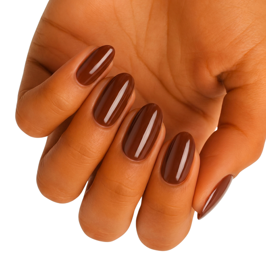Glossy chocolate brown nail wraps on almond-shaped nails, solid rich colour finish.
