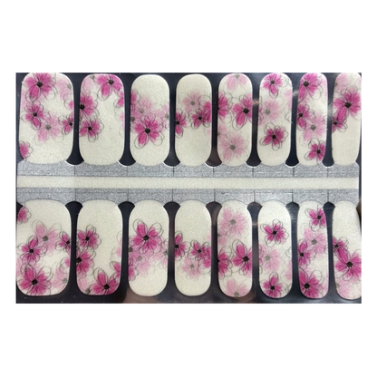 Cream nail wraps with sheer pink watercolour floral design and grey outline sketches