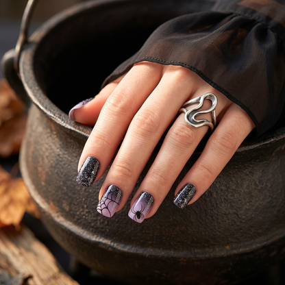 Short square soft gel press-ons, black glitter and lilac ombré with spider and web design