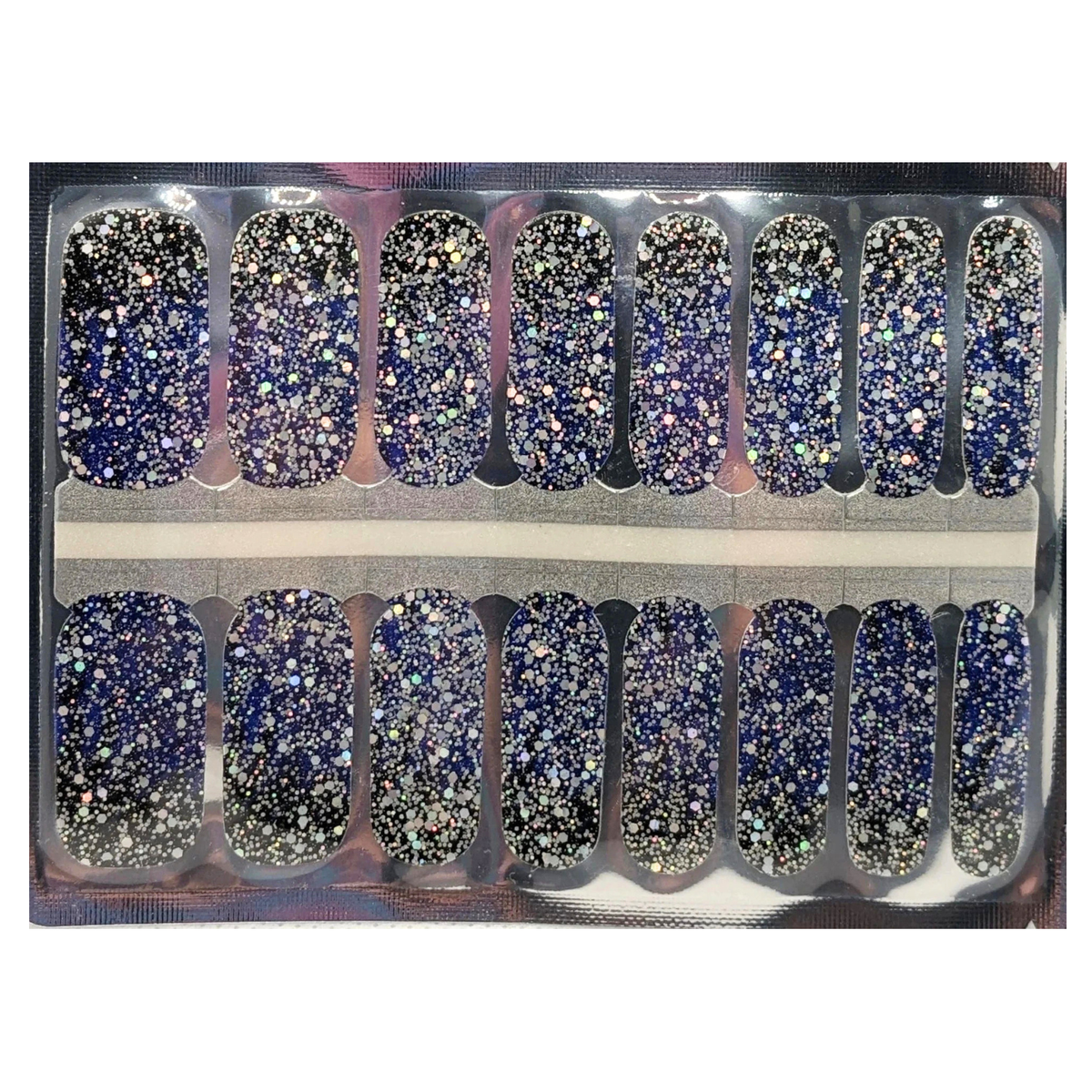Navy nail wraps with dense holographic silver glitter in a galaxy-style finish