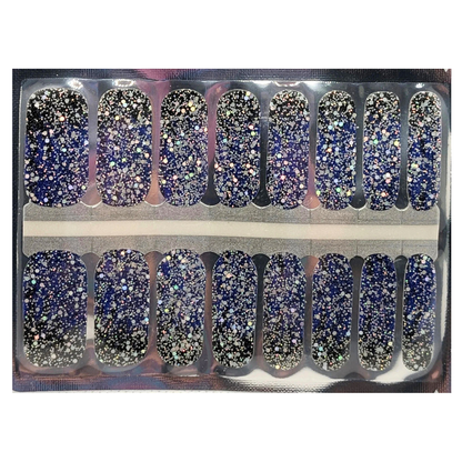 Navy nail wraps with dense holographic silver glitter in a galaxy-style finish