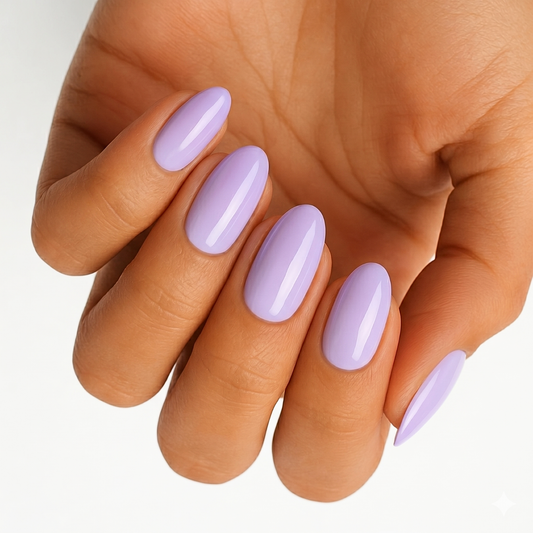 Glossy pastel lavender nail wraps in a solid colour on almond-shaped nails.
