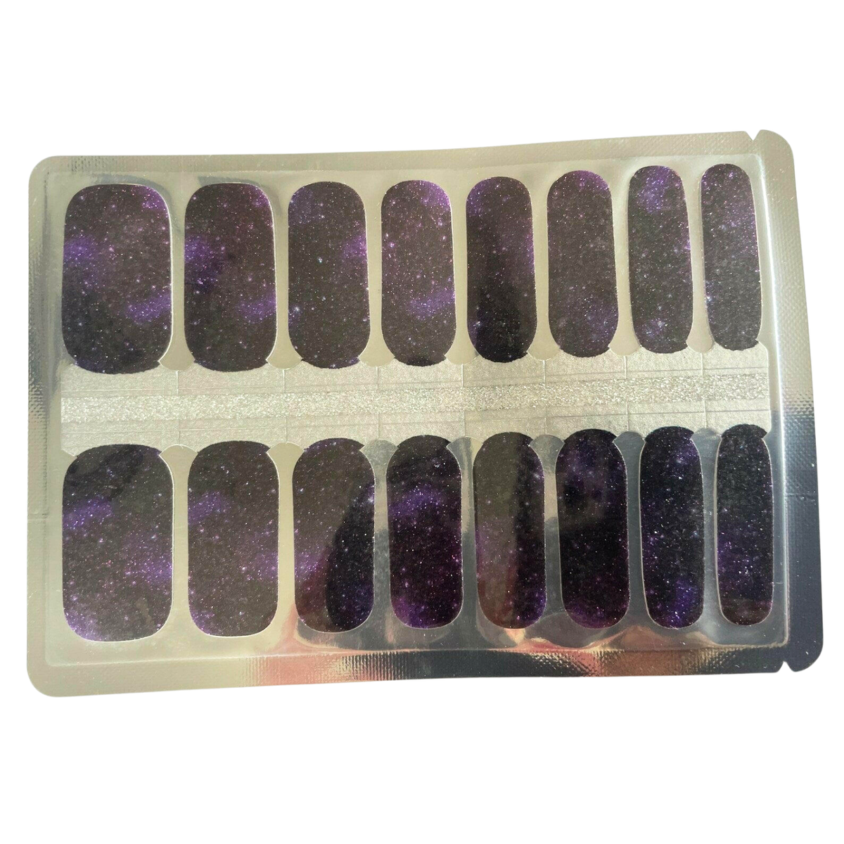 Holy Classics nail wraps in purple and black galaxy design with glittery starry finish