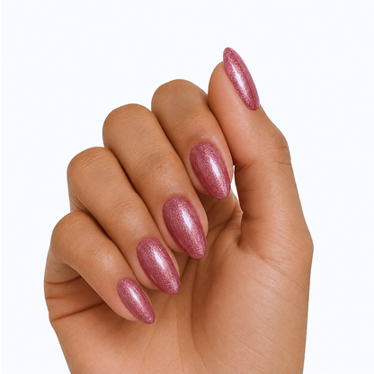 Rose pink shimmer semi-cured gel nail wraps on almond-shaped nails