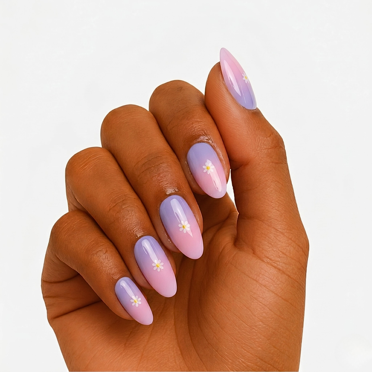Purple-to-pink ombré semi-cured gel wraps with glossy finish and tiny daisy accents