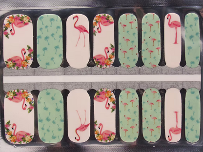 Holy Classics nail wraps with pink flamingo and tropical palm tree design on mint and cream