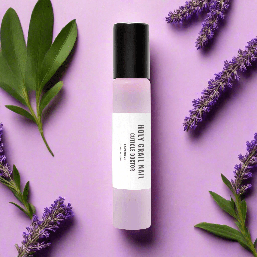 Lavender cuticle oil with purple flowers on lilac background for nail care