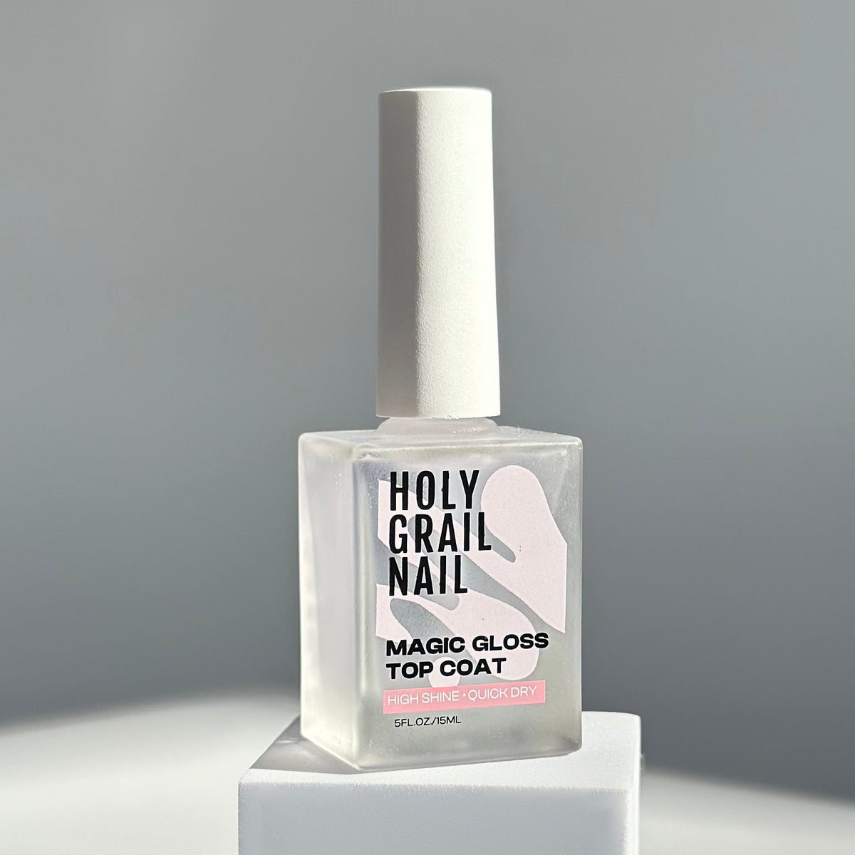 Clear glossy top coat nail polish bottle for at-home manicure finishing