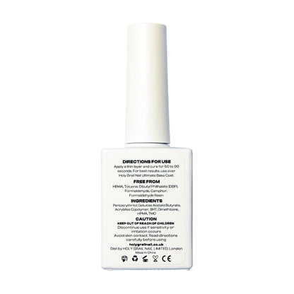 White nail glue bottle with instructions for gel nail wraps and press-on nails