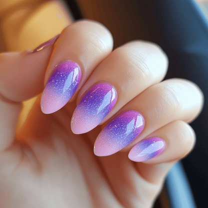 Purple pink ombre gel nail wraps with glitter gradient on hand showing glossy finish