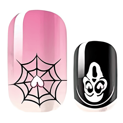 Glow in the dark nail wraps featuring pink ghost and black spider web Halloween nail art