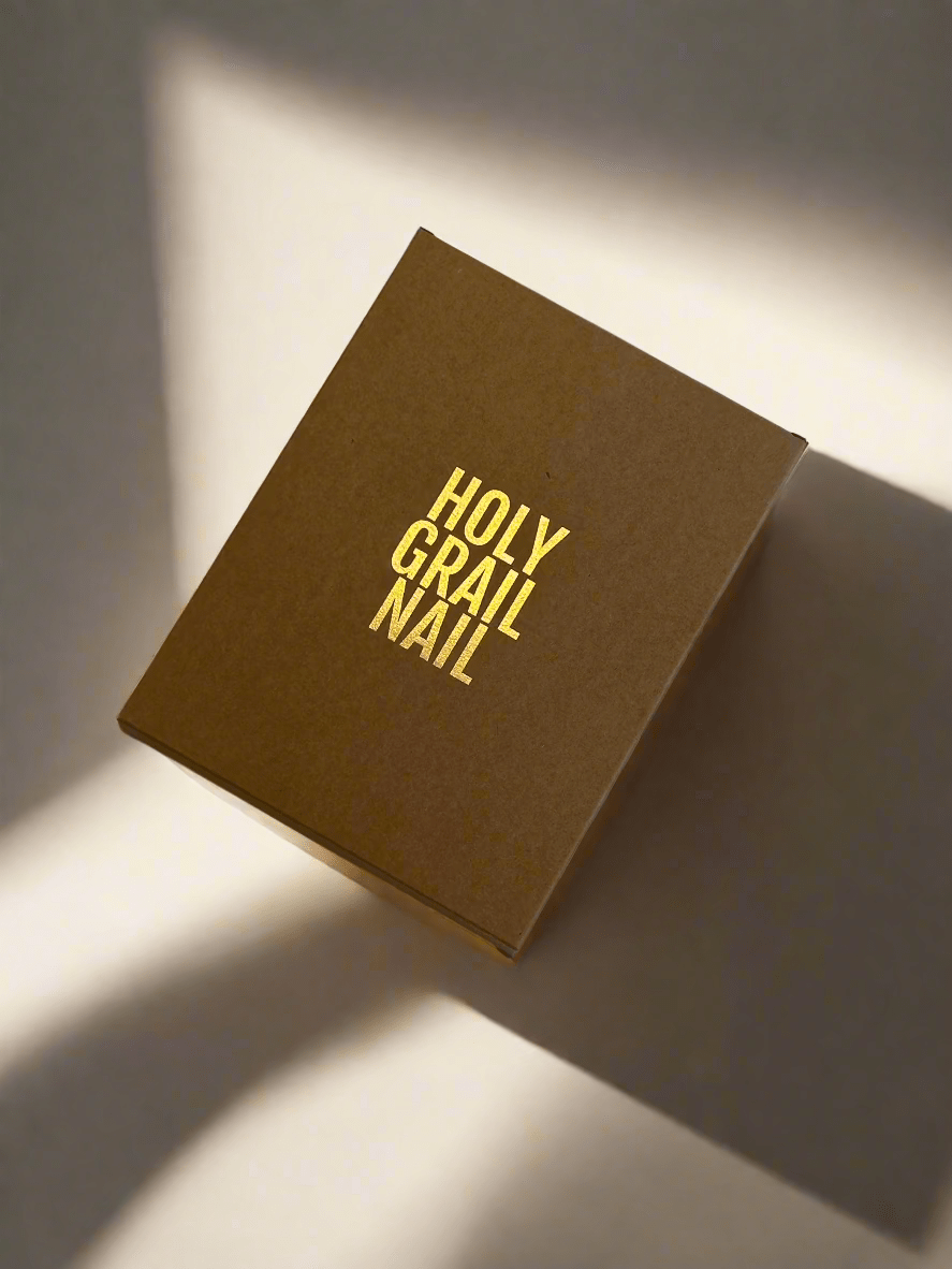 Brown gift box with gold text for nail wrap starter kit