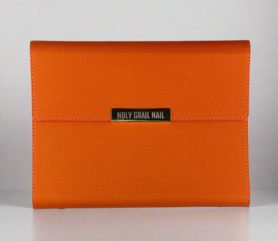 Orange leather nail wrap storage binder for organising gel nail wraps and accessories