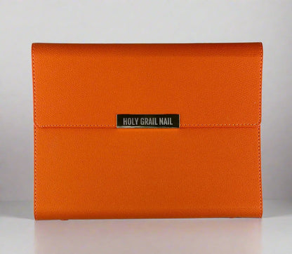 Orange leather nail wrap storage binder for organising gel nail wraps and accessories