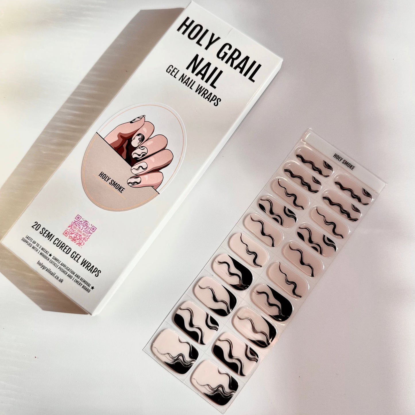 Semi-cured gel nail wraps packaging with black white smoke swirl design