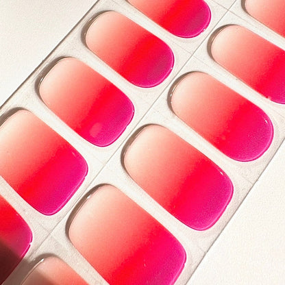 Pink to coral gradient gel nail wraps sheet showing ombre nail art design