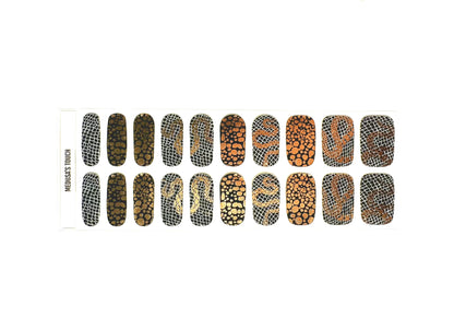 Gel nail wraps sheet featuring black snake scale and gold circular dot patterns