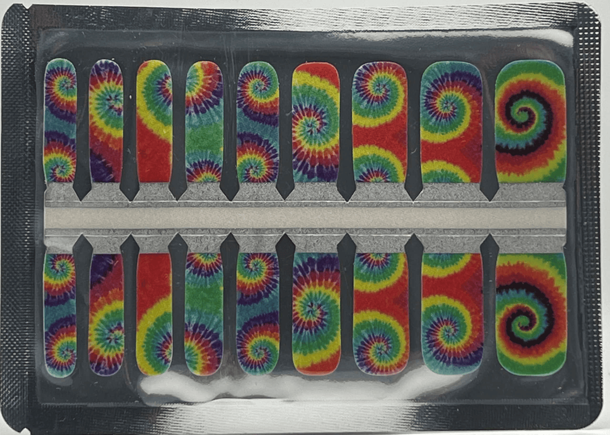 Kids nail wraps sheet featuring tie-dye patterns in rainbow colours with psychedelic swirl designs