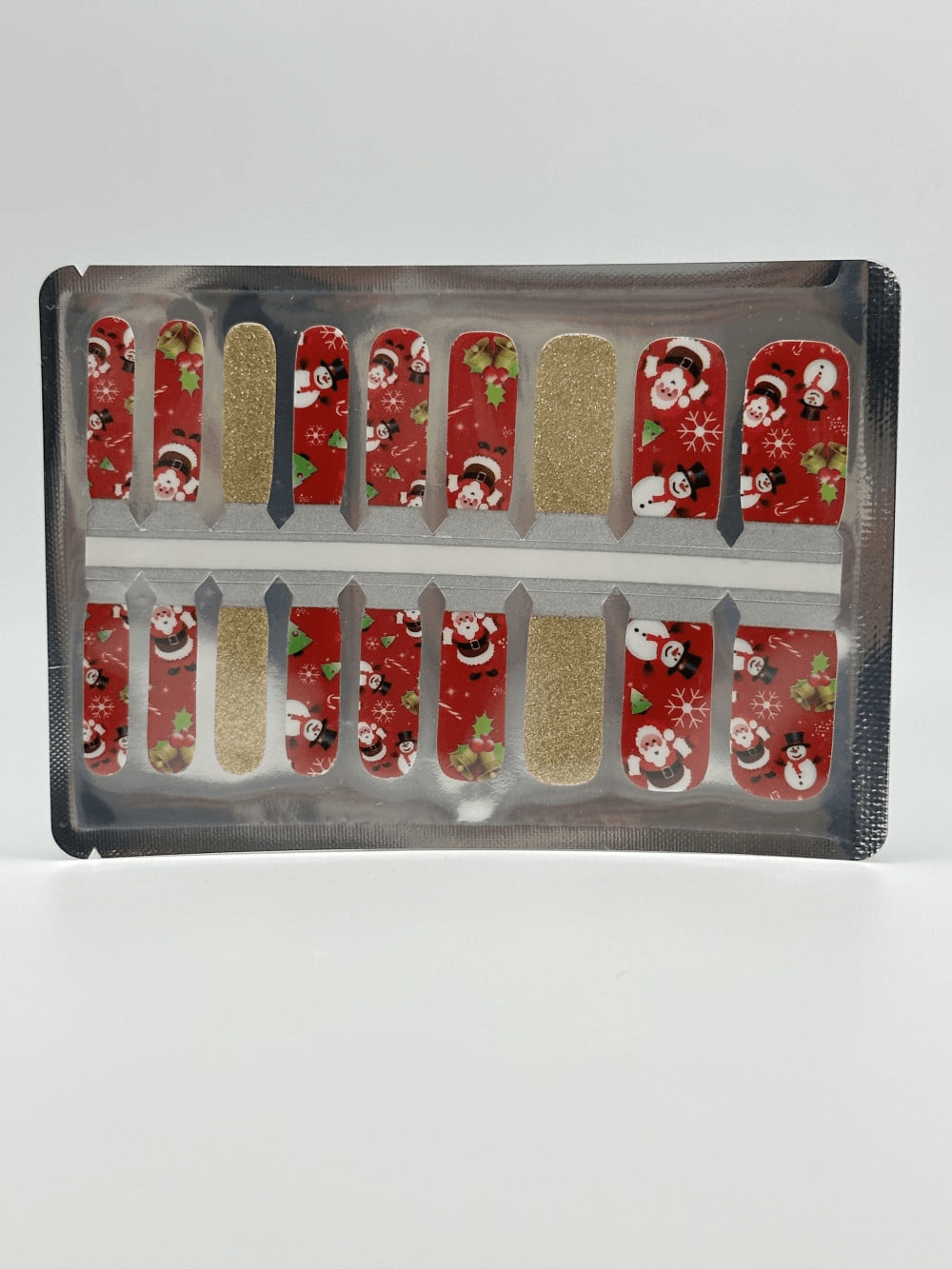 Christmas themed kids nail wraps sheet with red Santa and snowman patterns