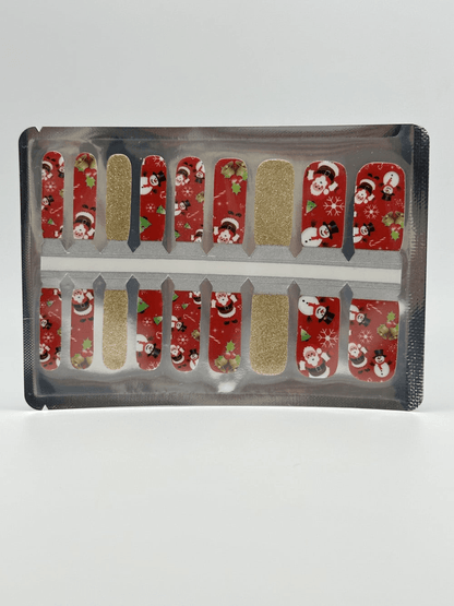 Christmas themed kids nail wraps sheet with red Santa and snowman patterns