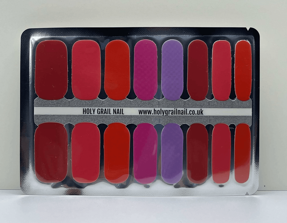 Berry nail wrap sheet displaying red coral pink purple solid colour options