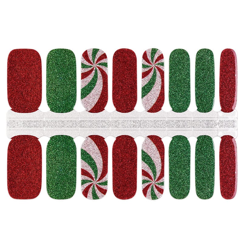 Christmas nail wraps sheet showing red and green glitter with candy cane swirl designs for at-home manicure