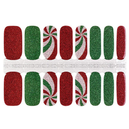 Christmas nail wraps sheet showing red and green glitter with candy cane swirl designs for at-home manicure