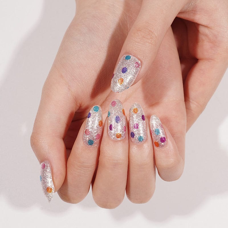 Silver glitter nail wraps with multicolour polka dots in a glossy finish