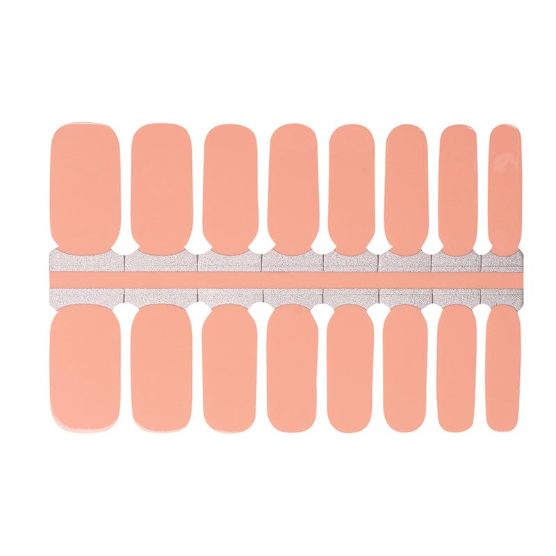 Peach-coral glossy nail wraps with a silver glitter accent stripe