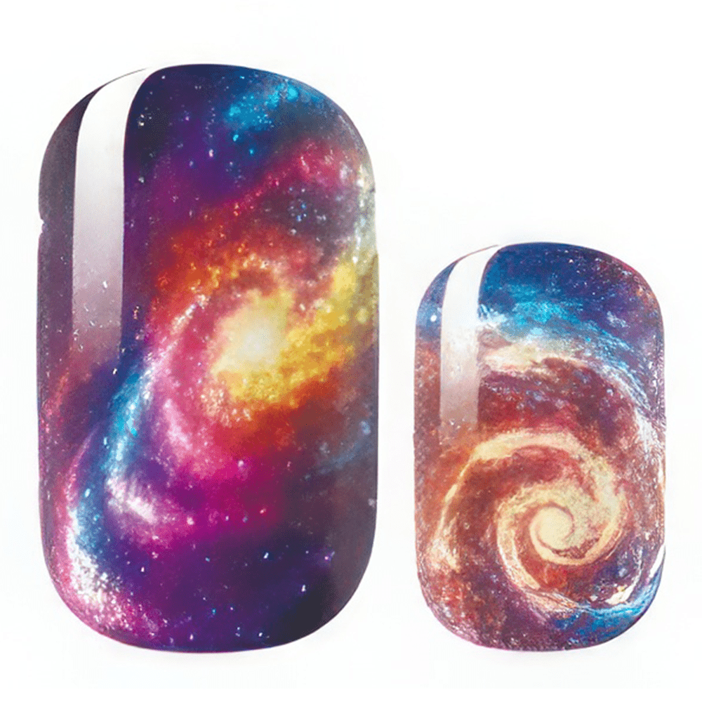Cosmic galaxy nail wraps featuring swirling nebula patterns in vibrant purple blue and orange