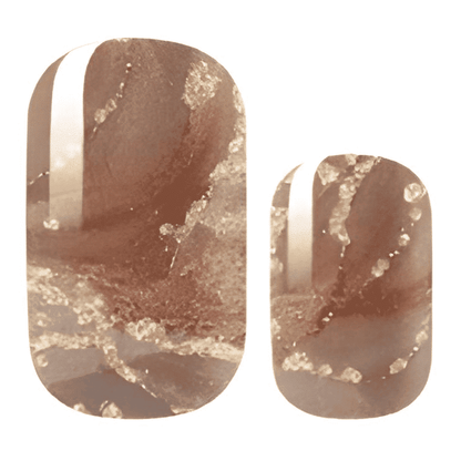 Brown marble-effect nail wraps with metallic gold veining and glossy stripe accent