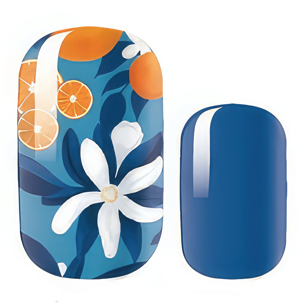 Blue and orange floral nail wraps featuring white flowers and citrus slice patterns