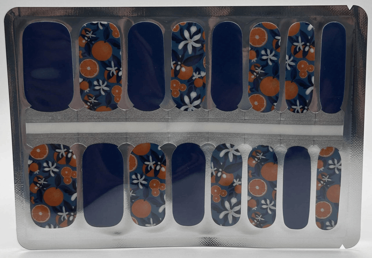 Navy blue nail wraps with orange clementine fruit pattern in classic manicure wrap sheet
