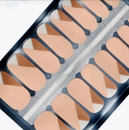 Pink and gold geometric nail wraps in packaging showing modern nail art design