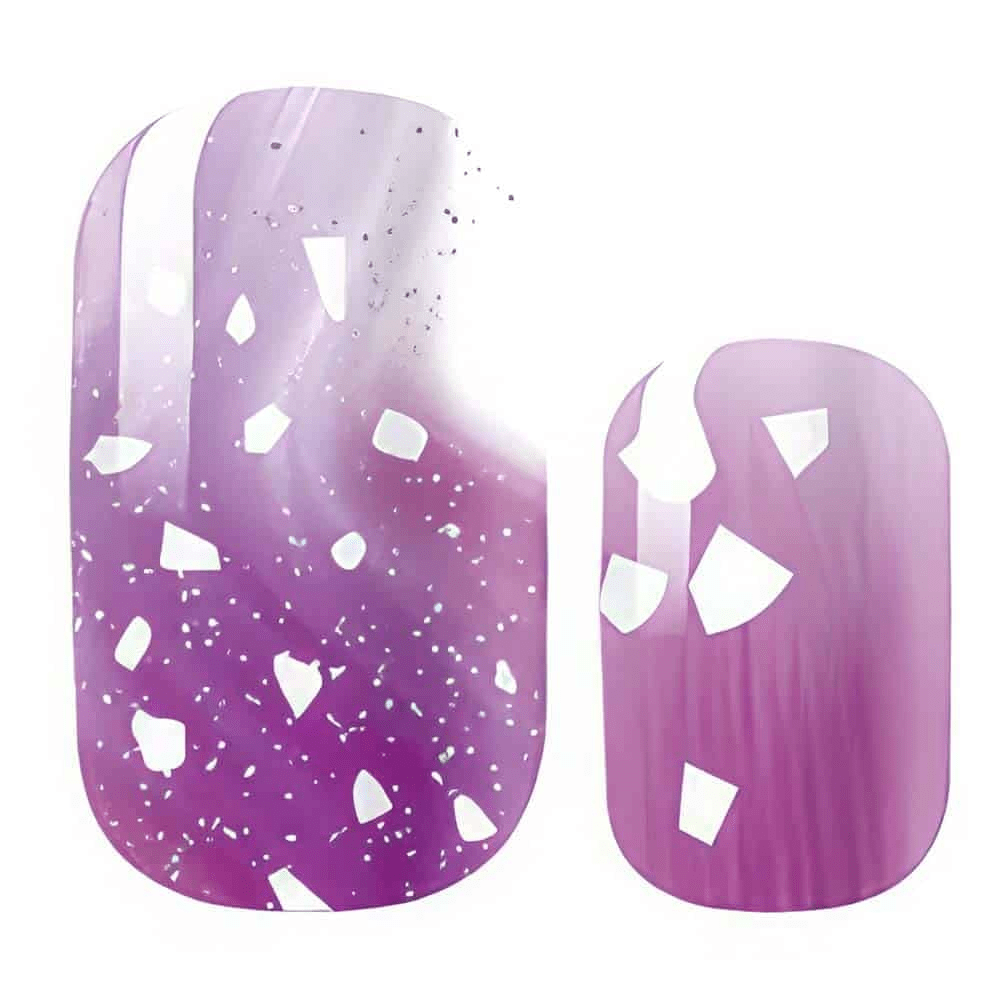 Purple gradient nail wraps with white glitter speckles and geometric patterns
