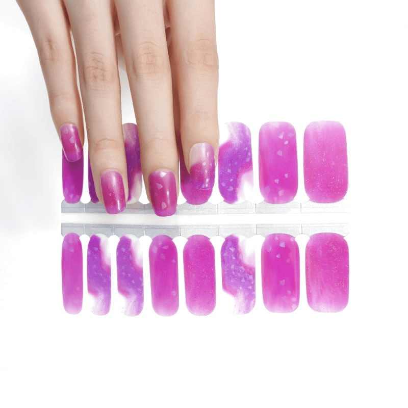 Magenta-purple marbled nail wraps with glittery flecks and watercolour-style white blending