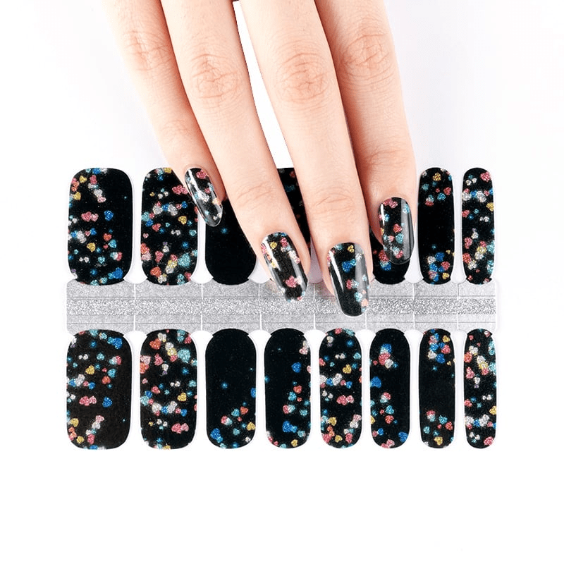 Black nail wraps with colourful glitter pattern flat lay showing full sheet design