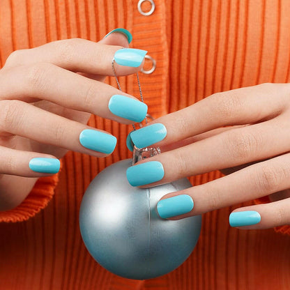 Turquoise blue glossy nail wraps on short square-rounded nails