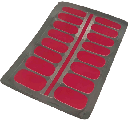 Sheet of solid deep red, glossy non-UV nail wraps, full set of sixteen.