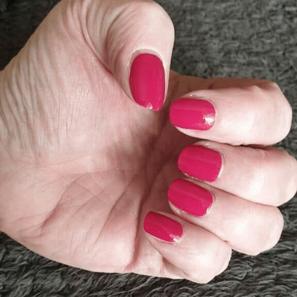 Bougainvillea Holy Classics non-UV nail wraps in glossy magenta-pink on short natural nails