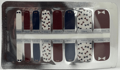 Pedicure nail wraps with red navy and white bowtie patterns for toenails