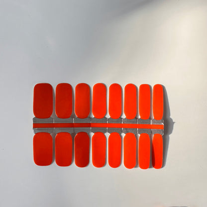 Bright orange red nail wraps sheet showing colour changing manicure design