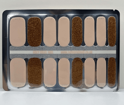 Nude and bronze glitter nail wraps, alternating sheer beige and sparkly copper design