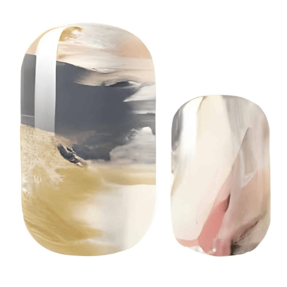 Nail wraps with abstract beach-scene print in sandy gold, navy and blush tones