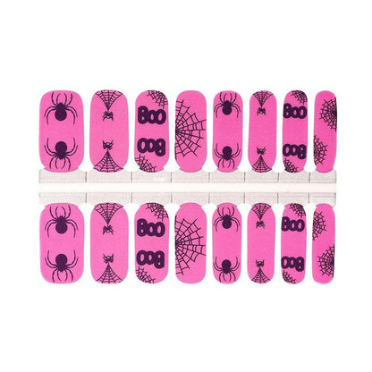Pink nail wraps with black spiders, spiderwebs and "Boo" Halloween print