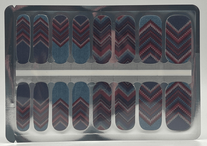 Sheet of cable knit nail wraps featuring blue burgundy chevron geometric patterns