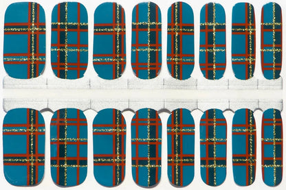 Sheet of teal tartan nail wraps with gold metallic lines in Scottish plaid pattern