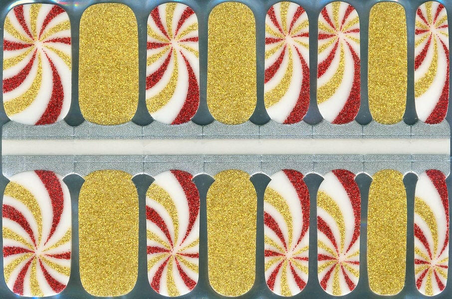 Candy cane nail wraps sheet featuring gold glitter and red white swirl patterns for Christmas manicure